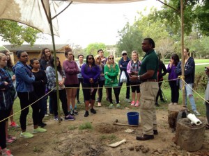 lsu interior design students grouped around rural site on field trip